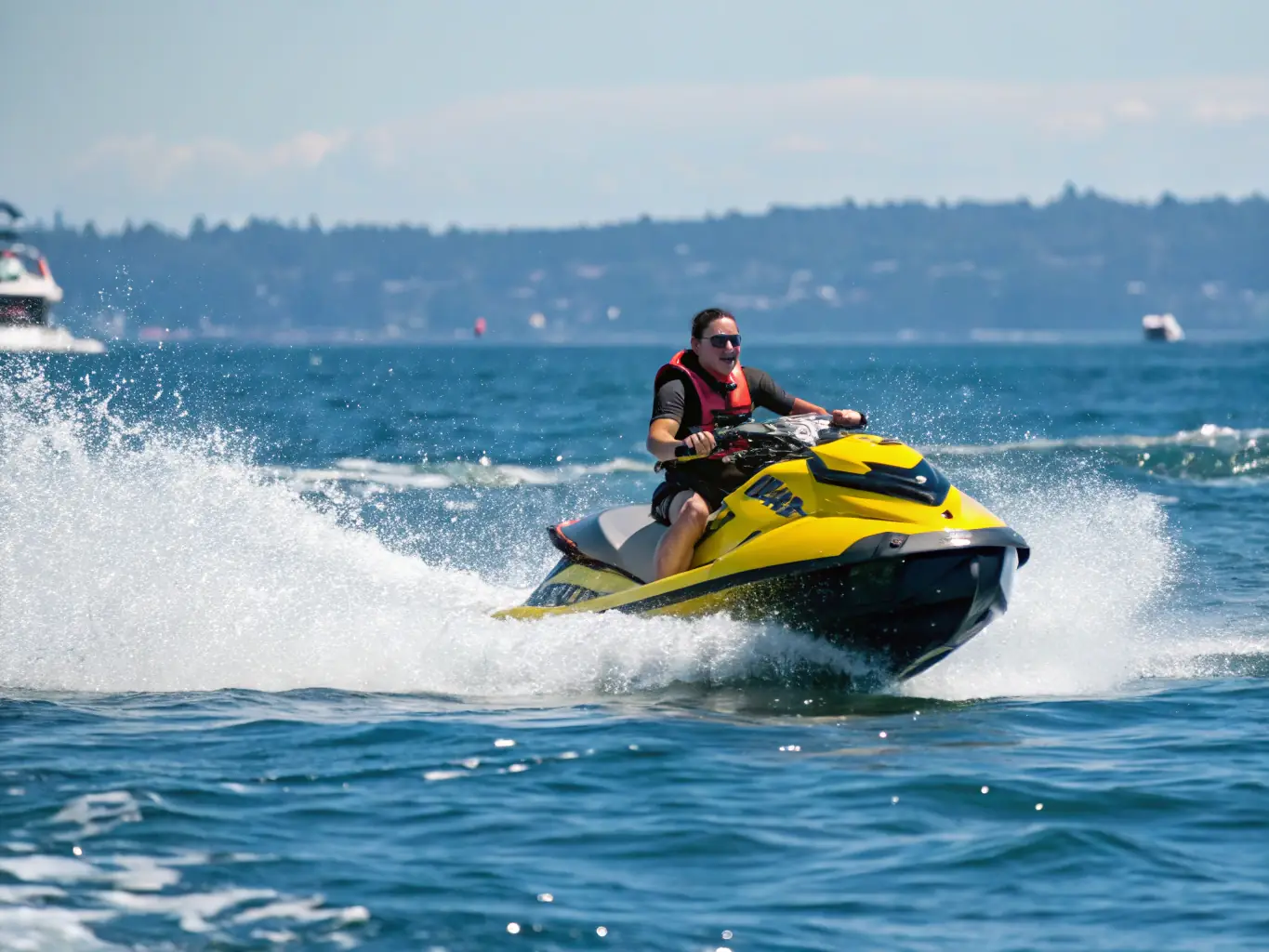 A sleek jet ski speeding across turquoise waters with a smiling rider in the foreground, showcasing the thrill of SeaDudes' Jet Ski Adventures.